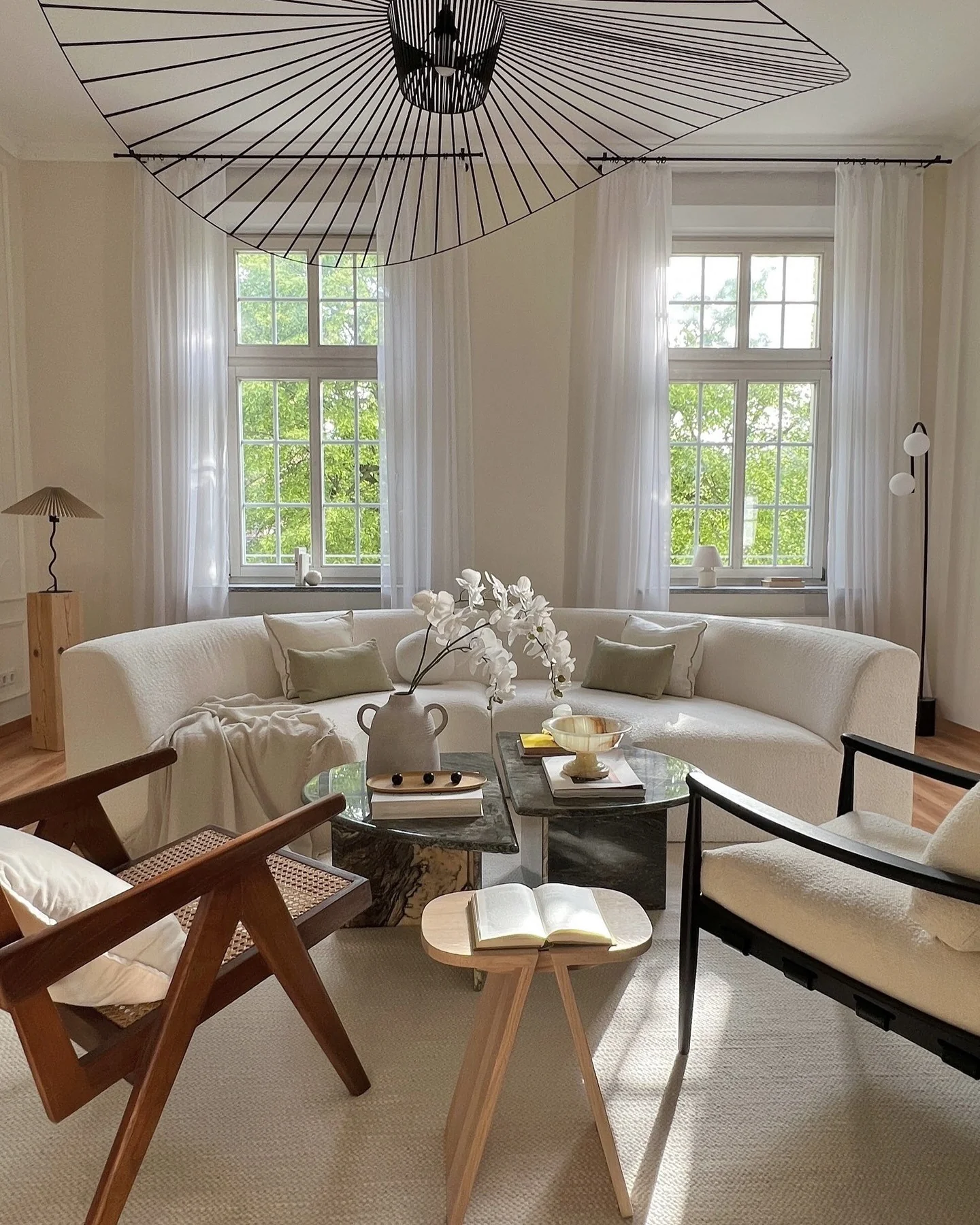 Curved Boucle Sofa Creates a Soft, Inviting Focal Point