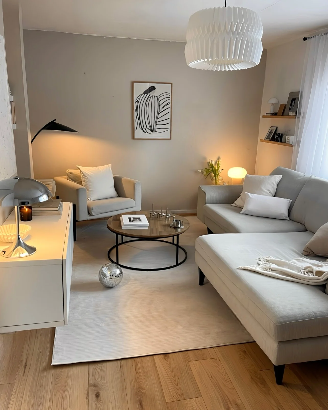 Abstract Art Adds a Graphic Focal Point Above a Neutral Sofa