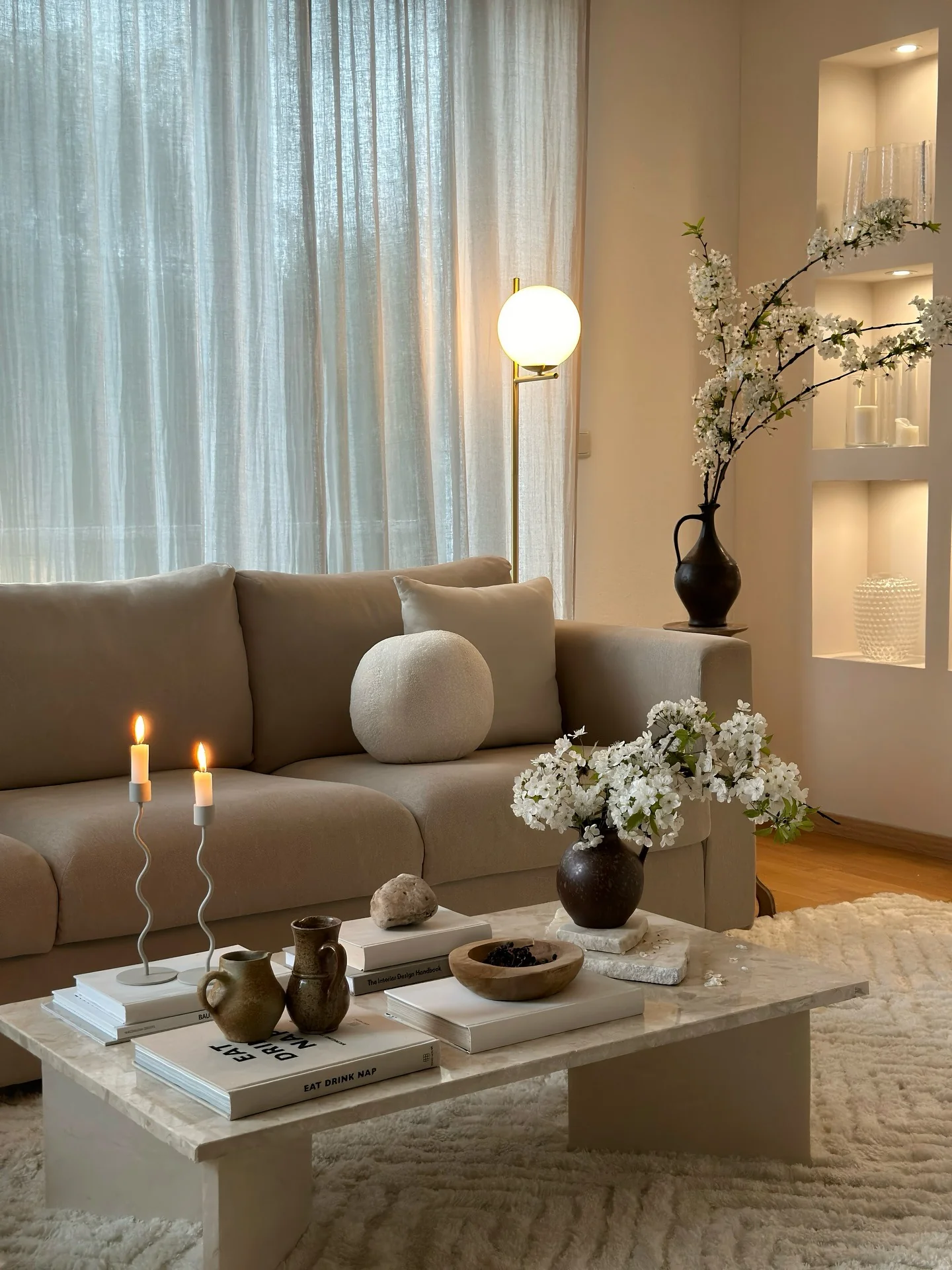 Ethereal White Branches Add Softness to a Neutral Room