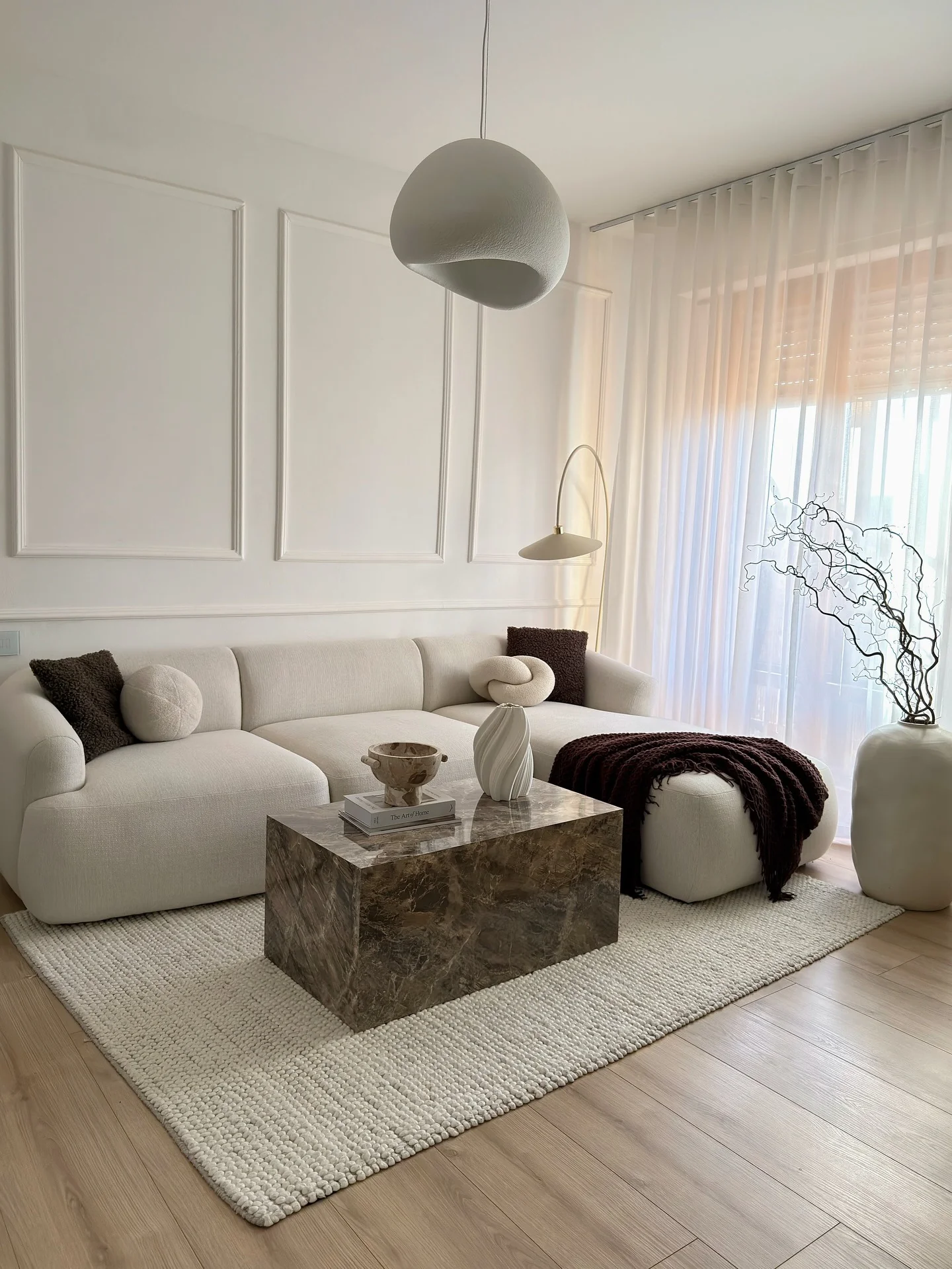 Textured White Rug Defines the Seating Area
