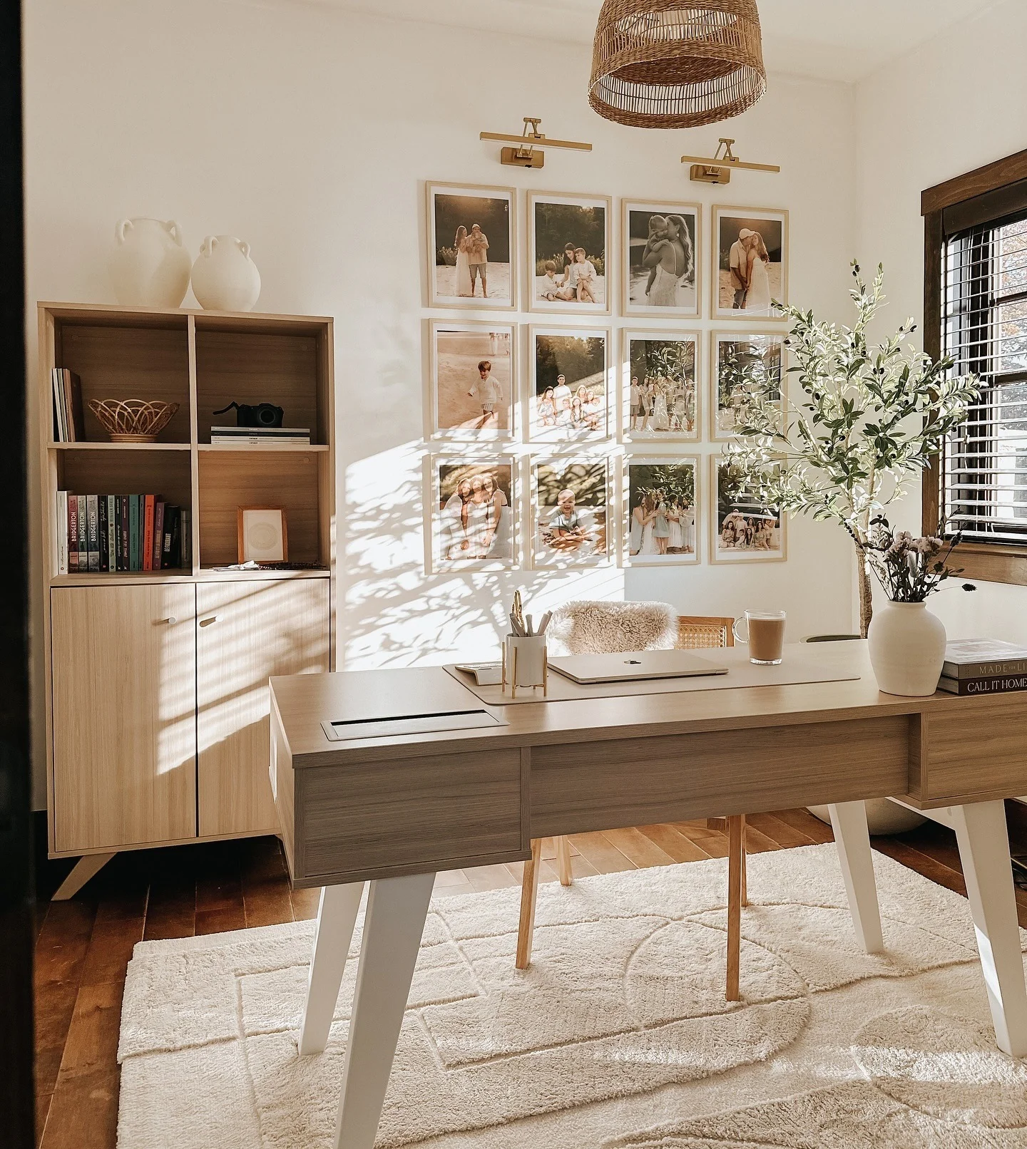 Gallery Wall of Photos Adds Personal Warmth Above Your Desk