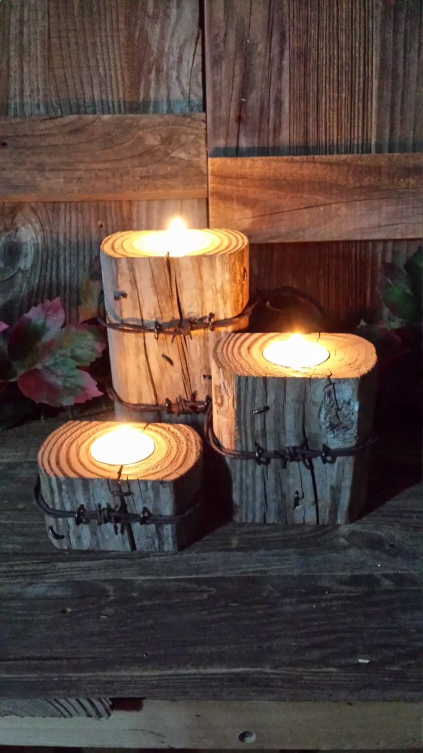 Incorporate Log Candle Holders Wrapped With Barbed Wire