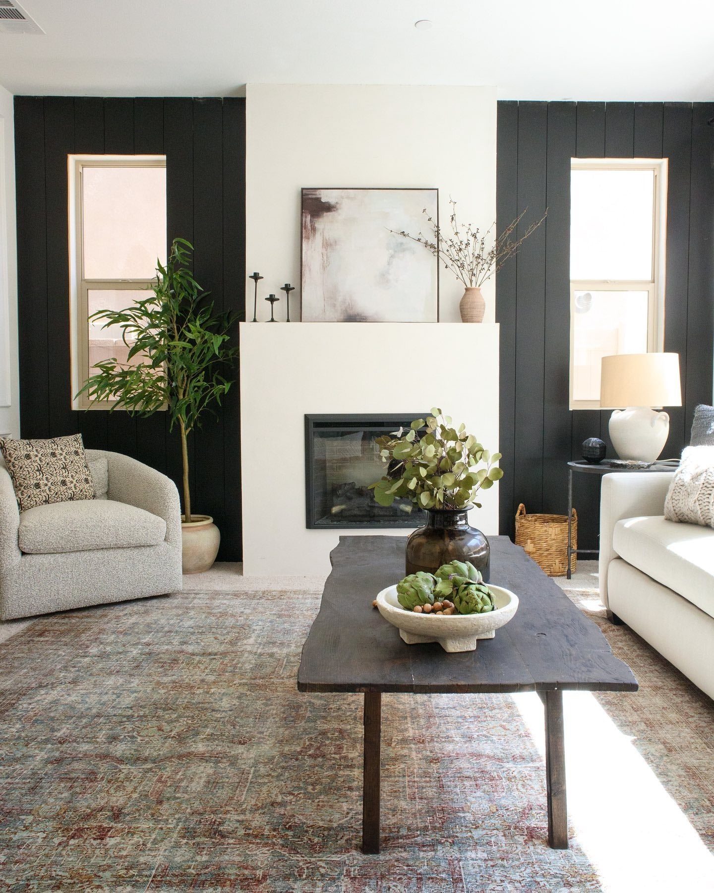 Ground Your Seating Area with a Dark Wood Farmhouse Table