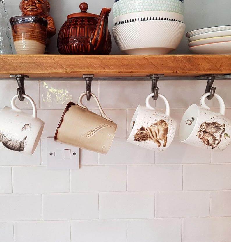Industrial Hooks on a Rustic Wood Shelf