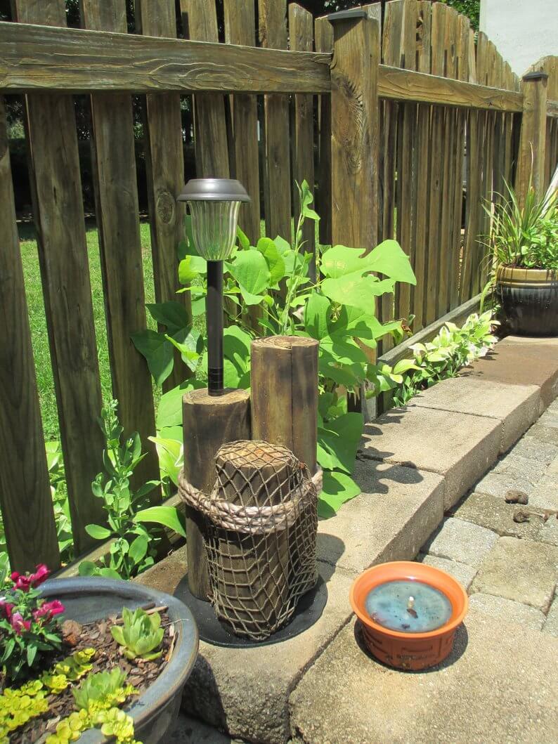 Wooden Post Pedestals Hold Solar Garden Lights