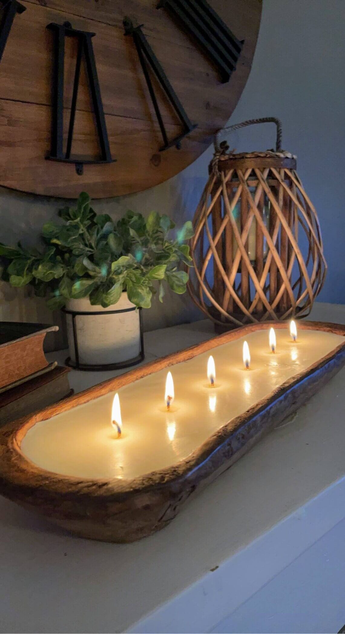 Ambiance with Multiple Candles in a Long Wooden Bowl