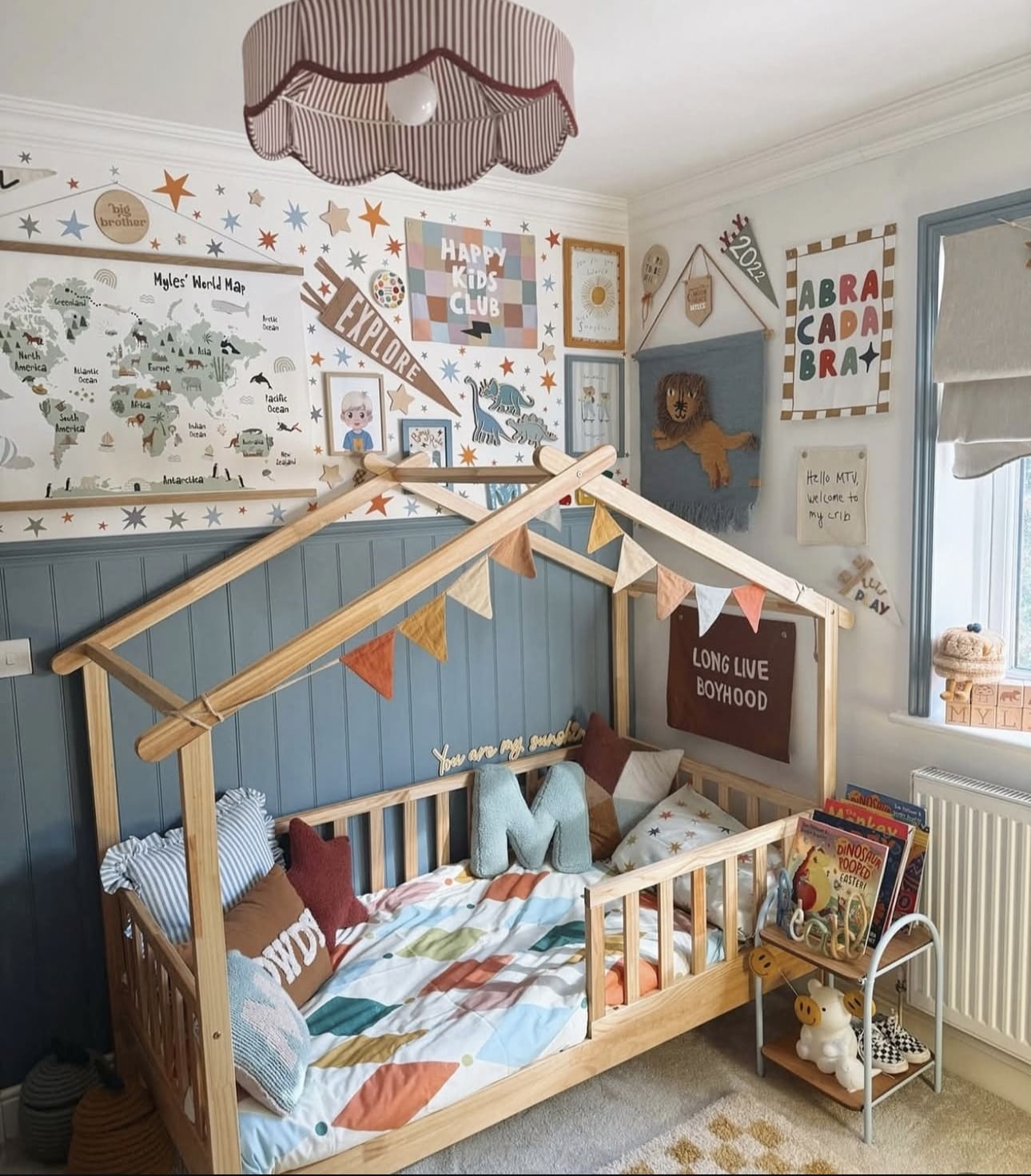House Bed Frame Draped With Playful Bunting