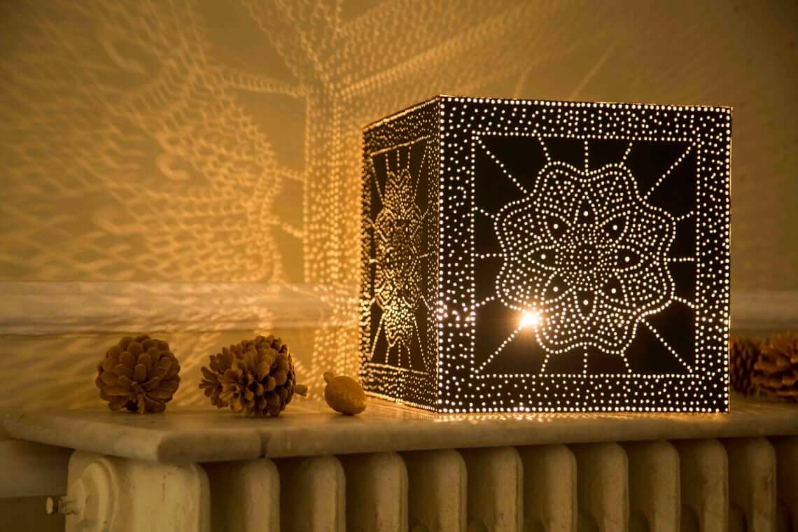 Perforated Lantern Shade Casts Intricate Shadow Play