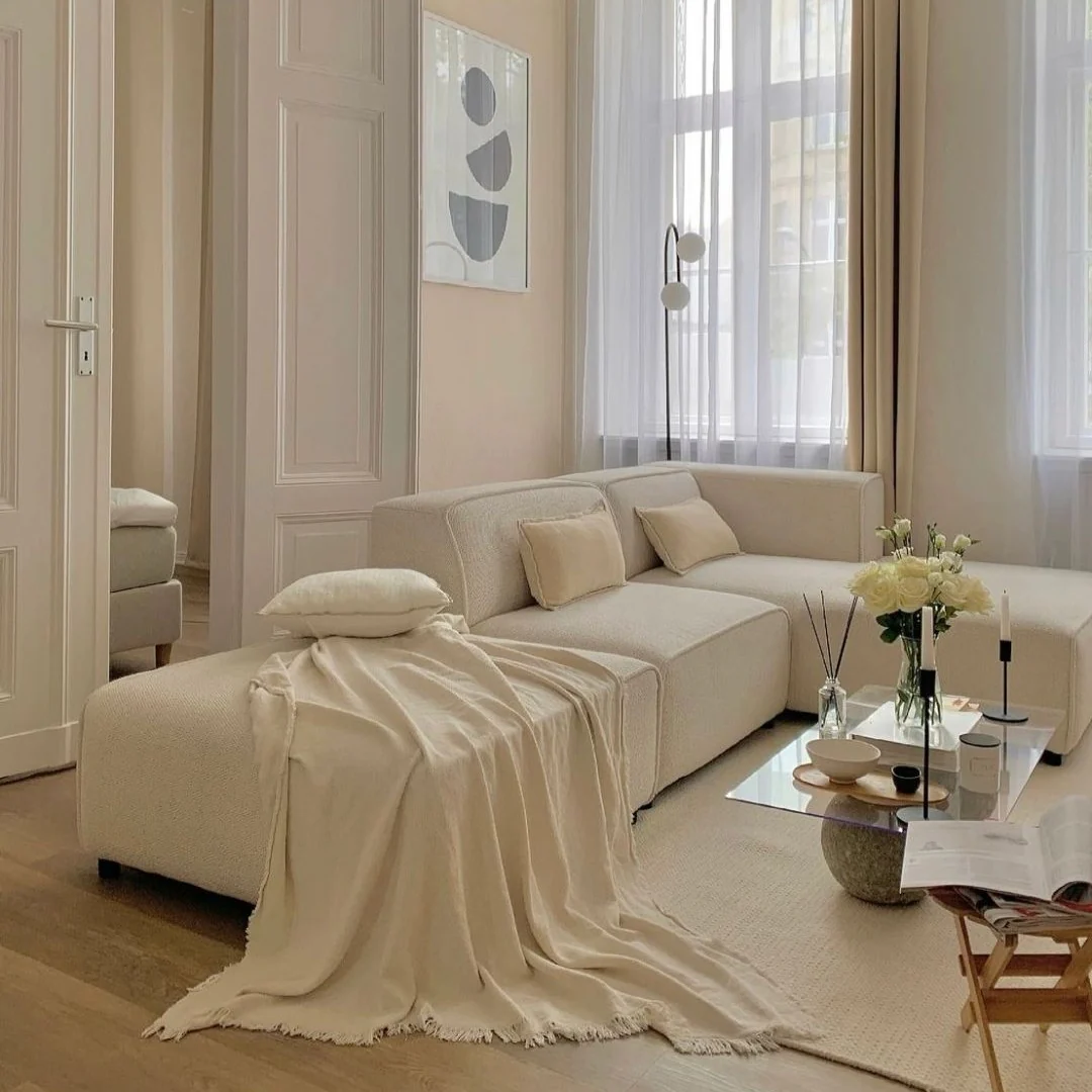 Textured Bouclé Sofa in Cream Creates a Soft Lounge Zone