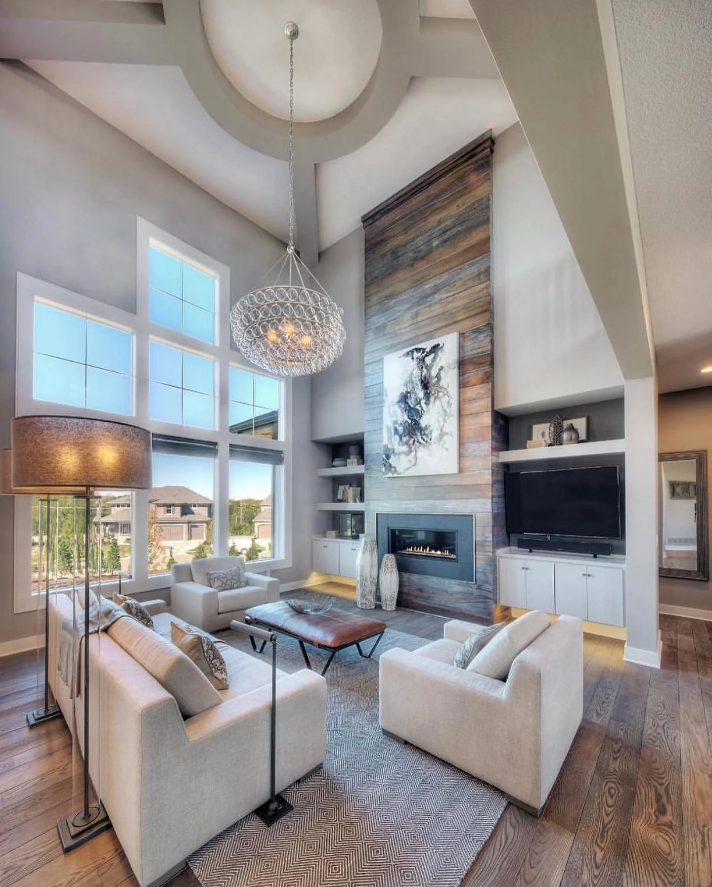 Tall, Planked Wood Accent Wall Creates a Dramatic Focal Point