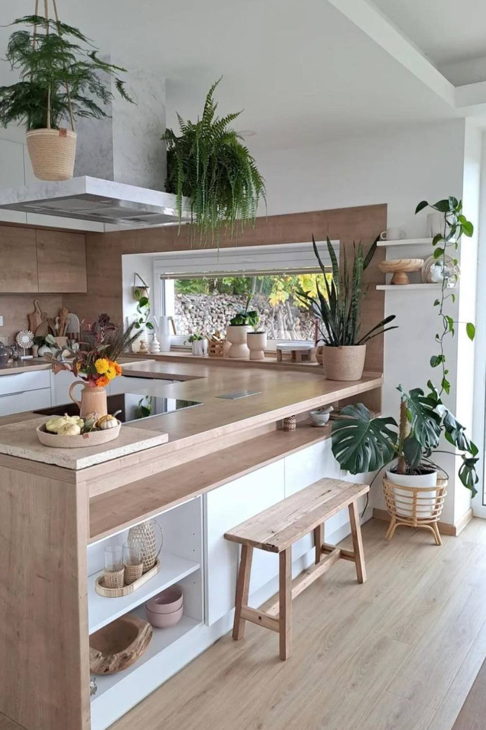 Hanging Baskets Add Vertical Greenery Above the Range