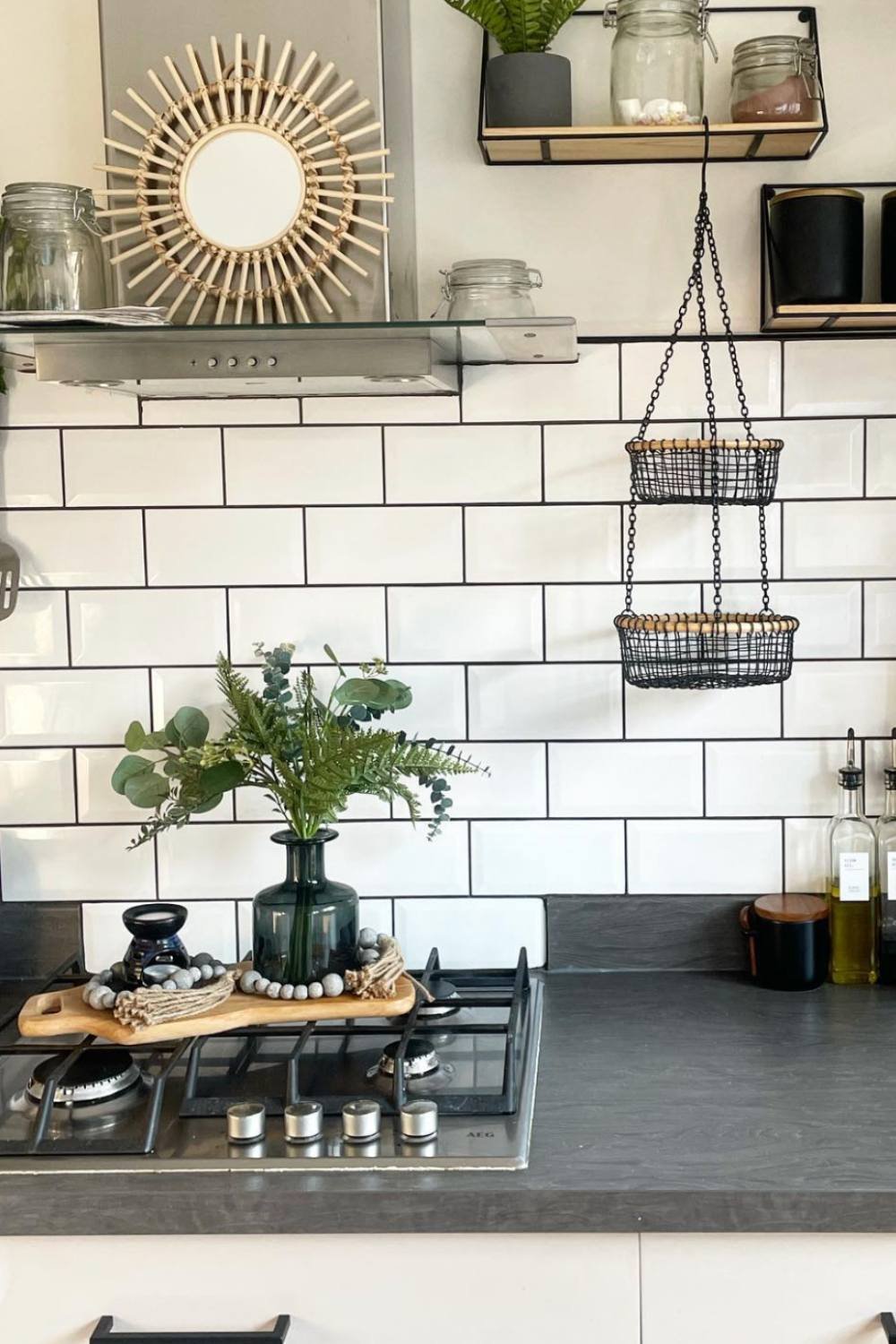 Tiered Hanging Baskets Add Global Texture Above the Stove