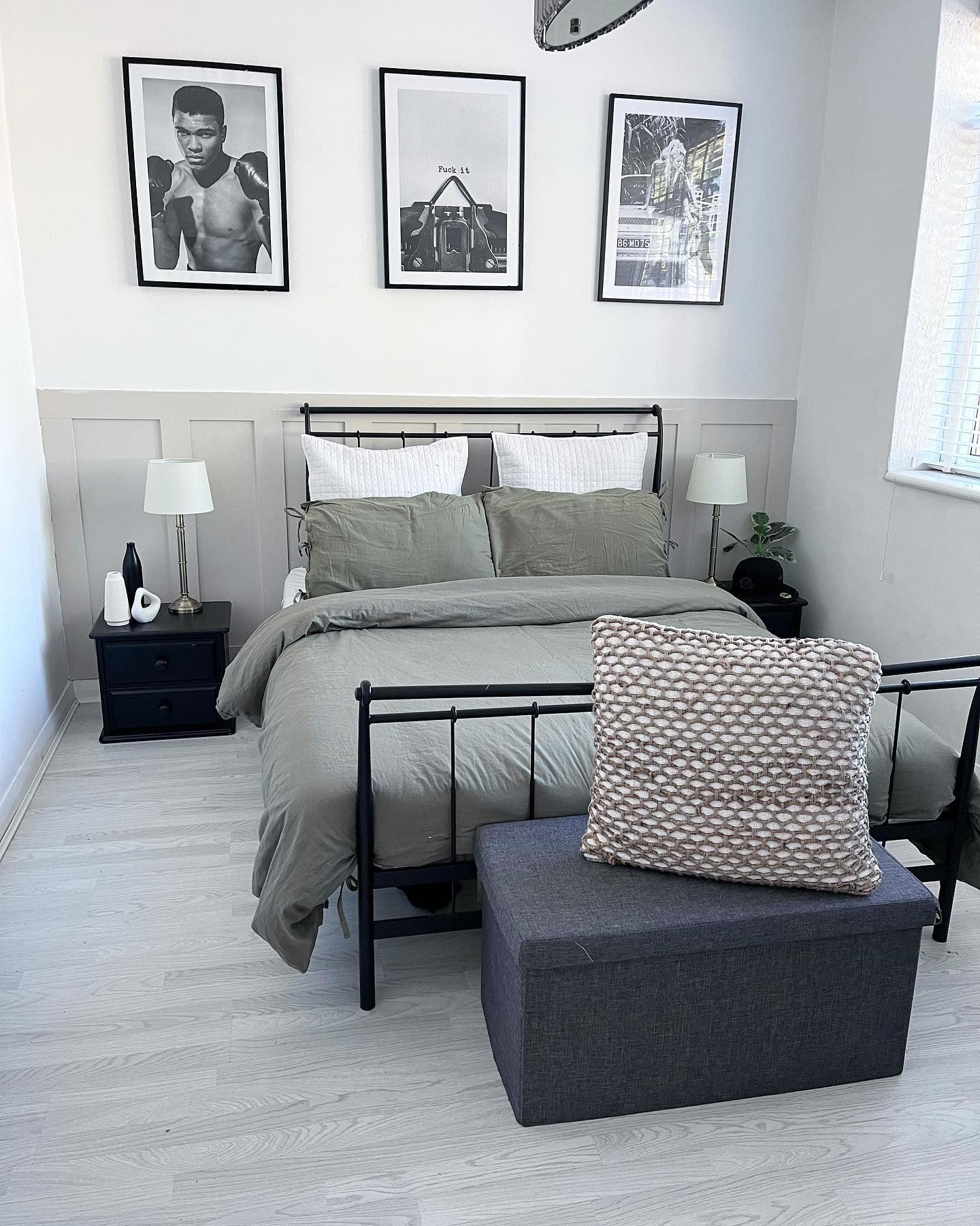 Framed Black and White Prints Add Bold Art Above the Bed