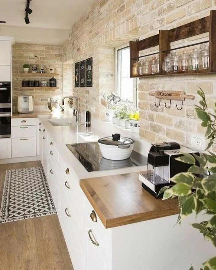 Wooden Spice Rack With Glass Jars Above Brick Backsplash
