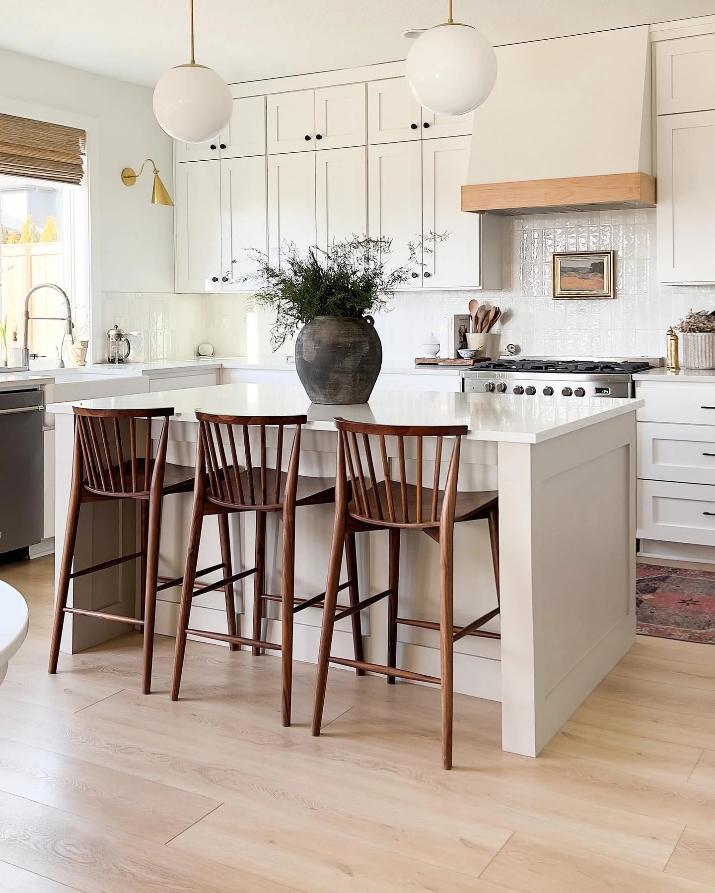 Ground Your White Island with Warm Wood Stools