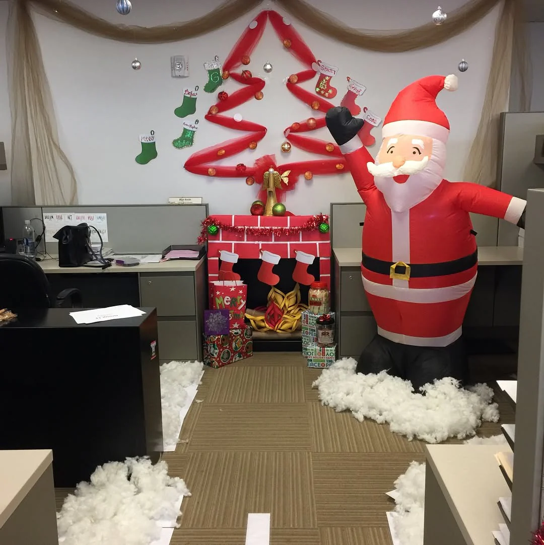 Inflatable Santa Brings Whimsical Cheer to Cubicles
