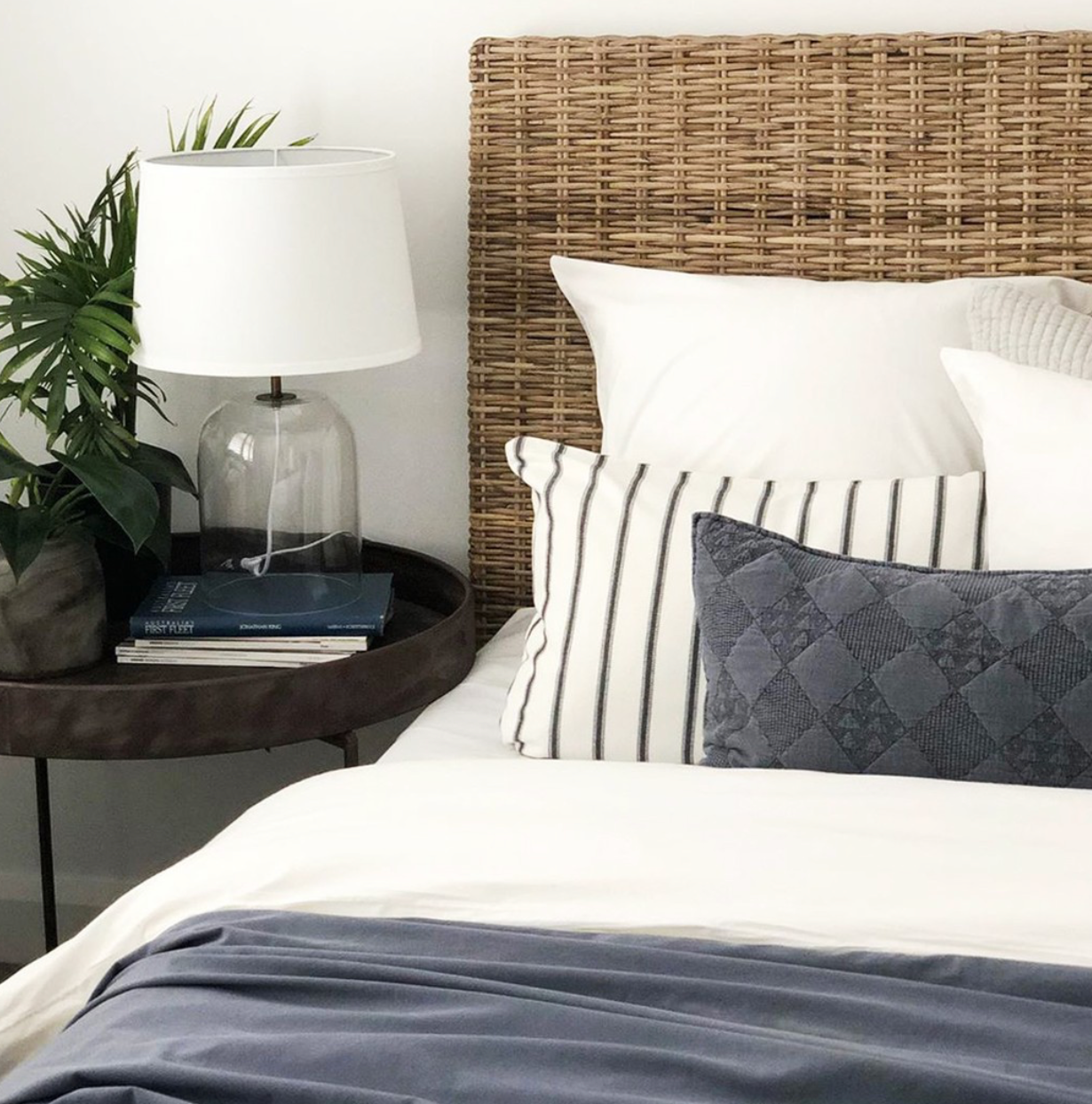 Woven Rattan Headboard Adds Natural Texture to Coastal Bedroom