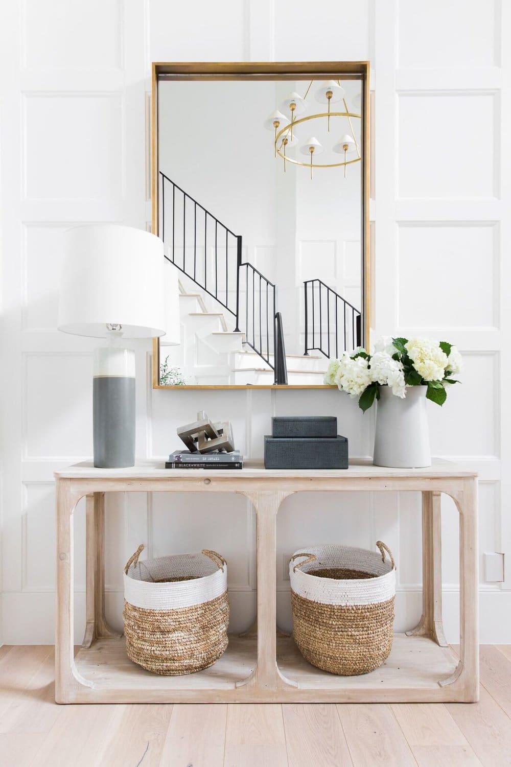 Stacked Textured Boxes Add Dimensional Storage to Console Table