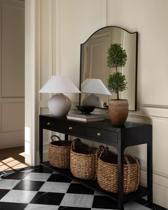 Arched Mirror Frames Entryway Greenery and Lamps