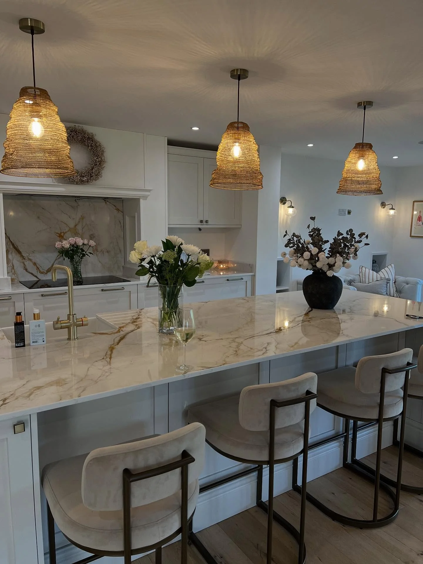 Soften a Stark Kitchen with Woven Pendant Lights