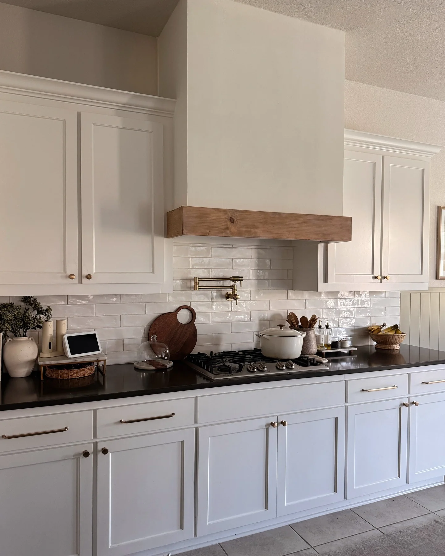 Warm Up White Cabinets with a Wooden Range Hood Accent