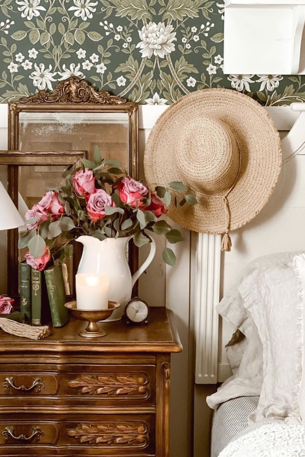Ornate Gold Mirror Frames a Vintage Vignette