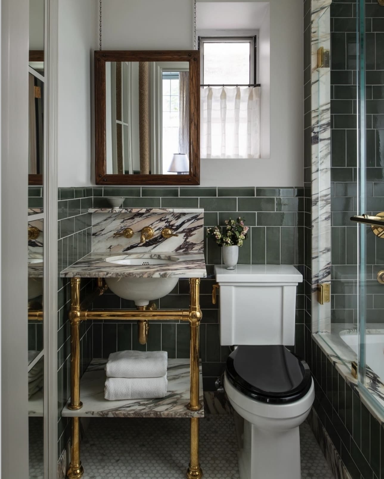 Marble and Brass Vanity Creates a Luxe Focal Point