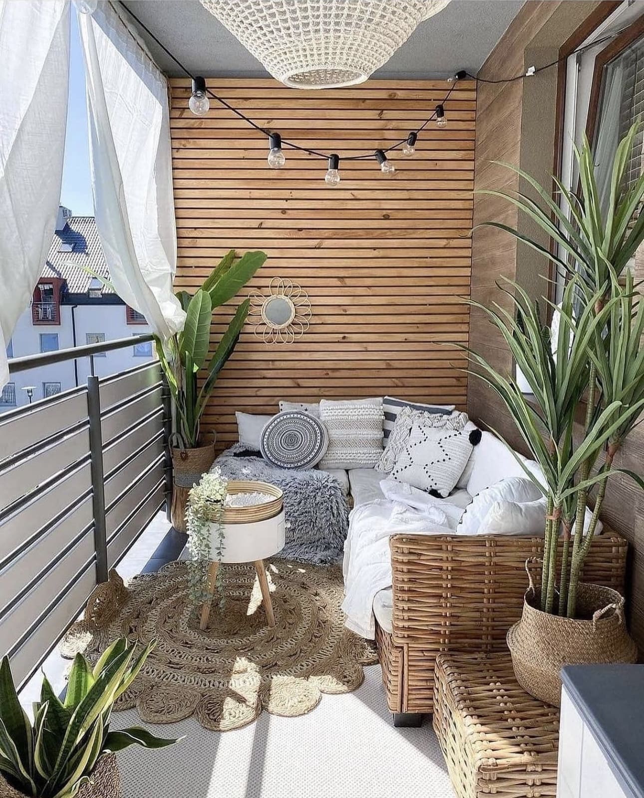 Woven Rattan Furniture Creates a Cozy Balcony Lounge