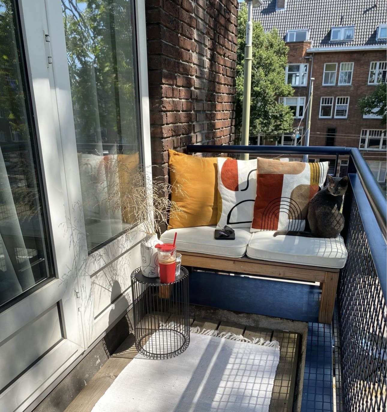 Geometric Pattern Pillows Add Modern Art to Balcony Seating