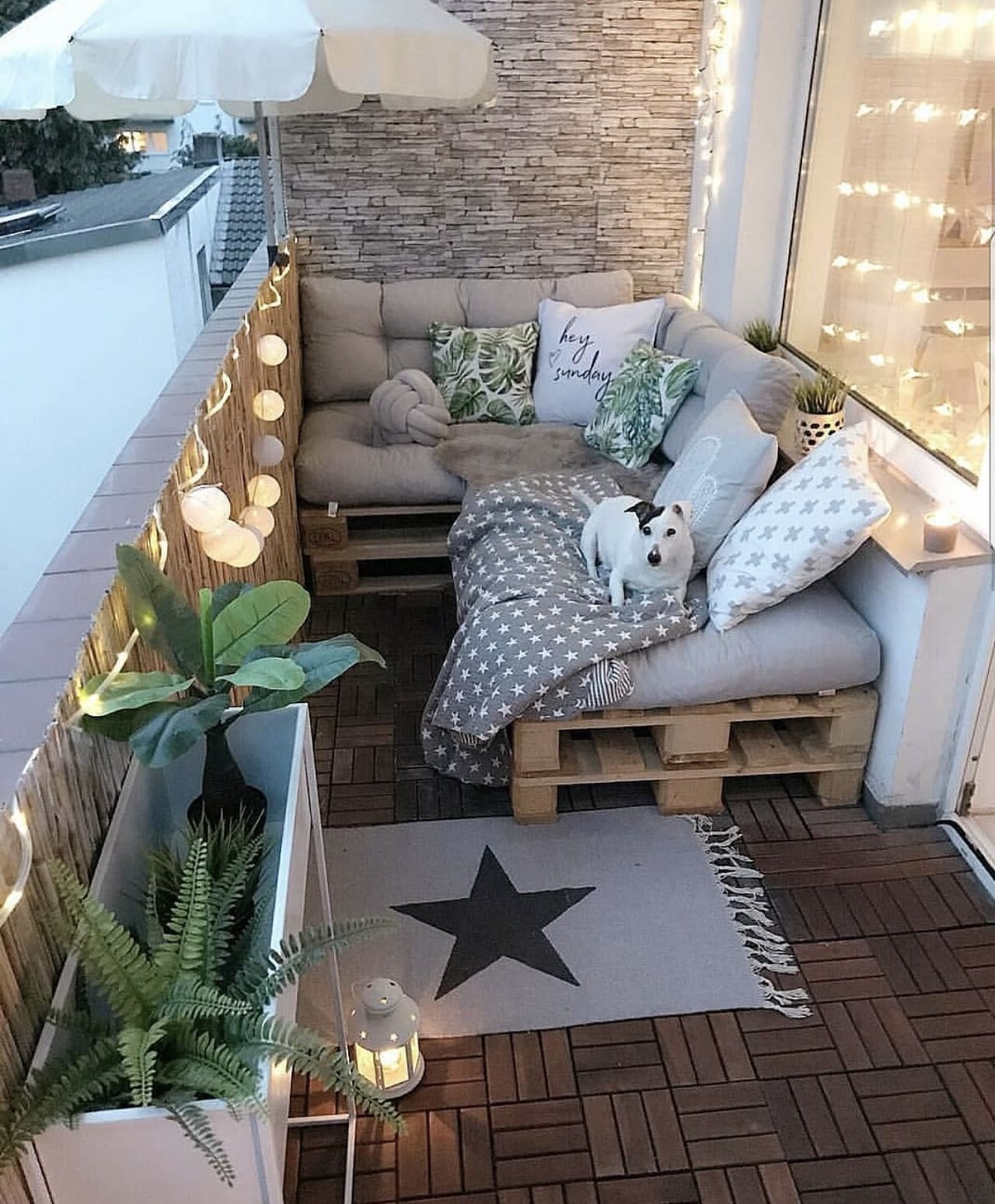 Grey Star Rug Anchors a Cozy Balcony Nook