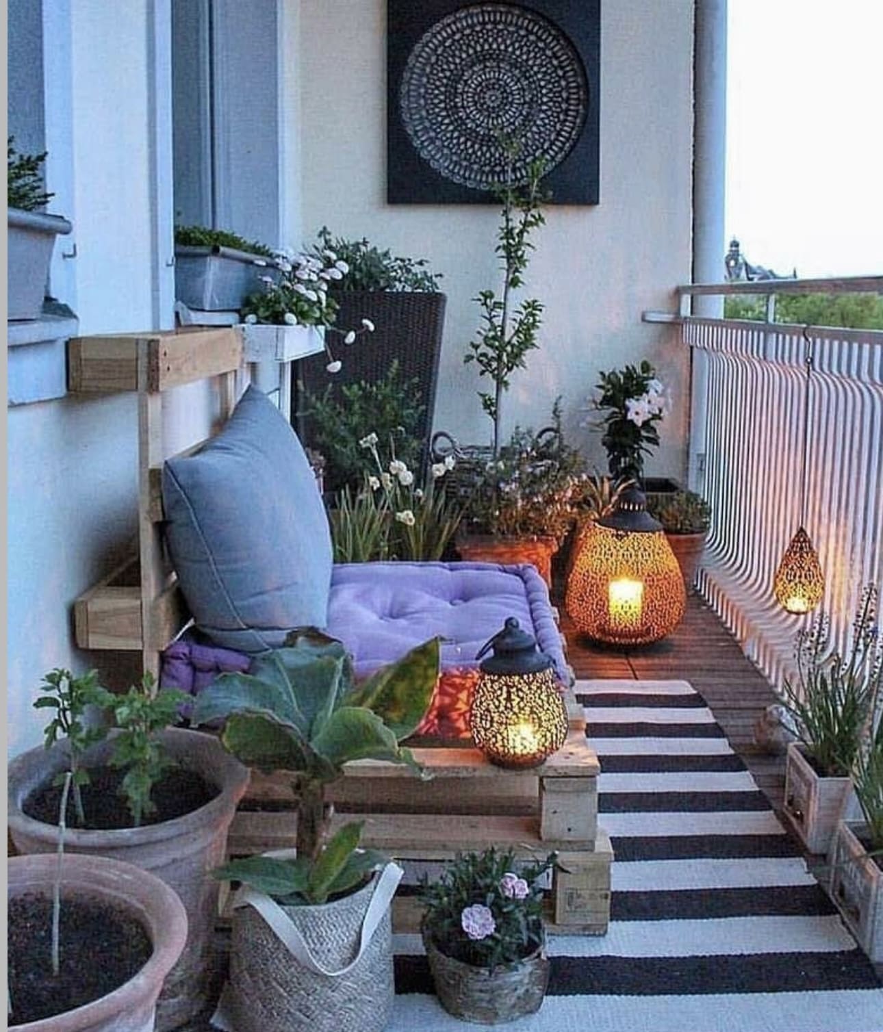 Ornate Metal Lanterns Add Ambiance to Evening Balcony Gatherings