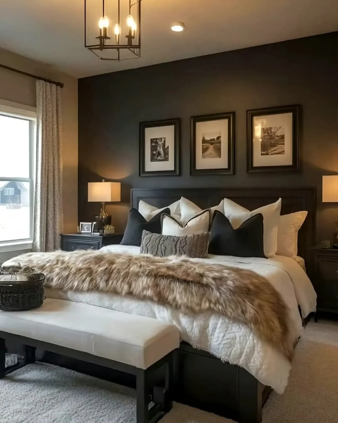 Three Black and White Photos Frame the Bed