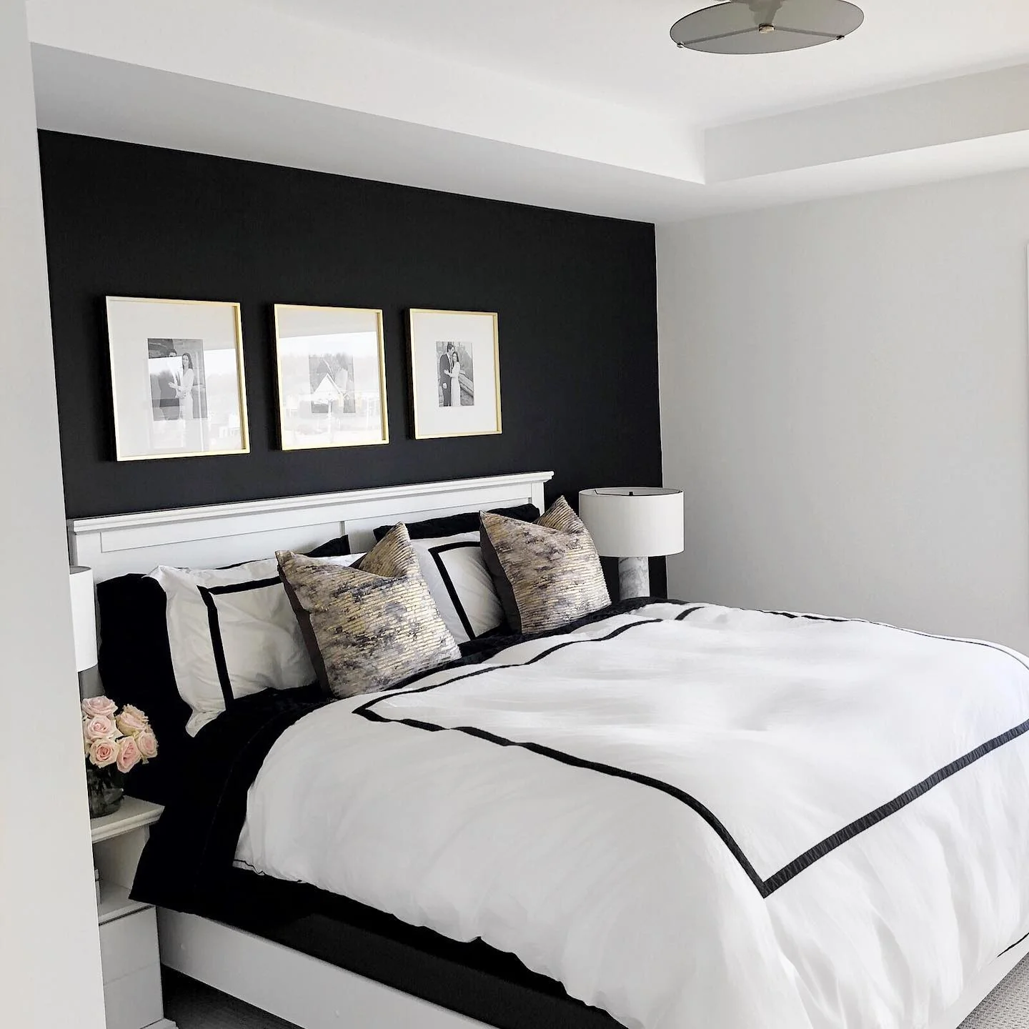 Personalize Your Black Wall with Framed Photos