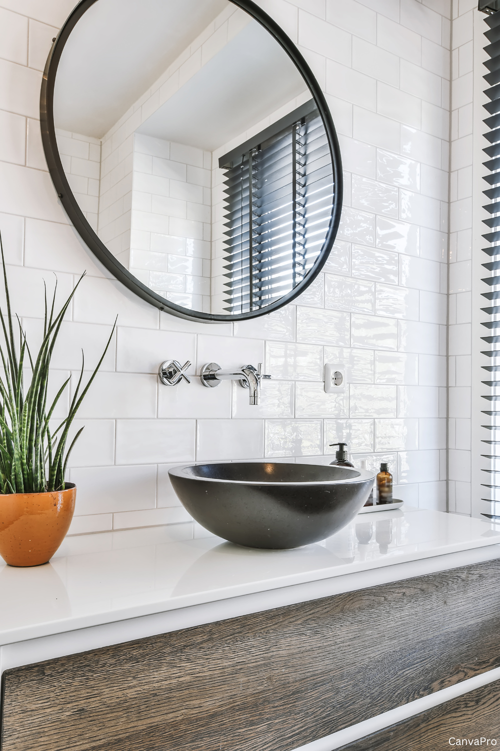 Matte Black Sink Anchors a White Vanity