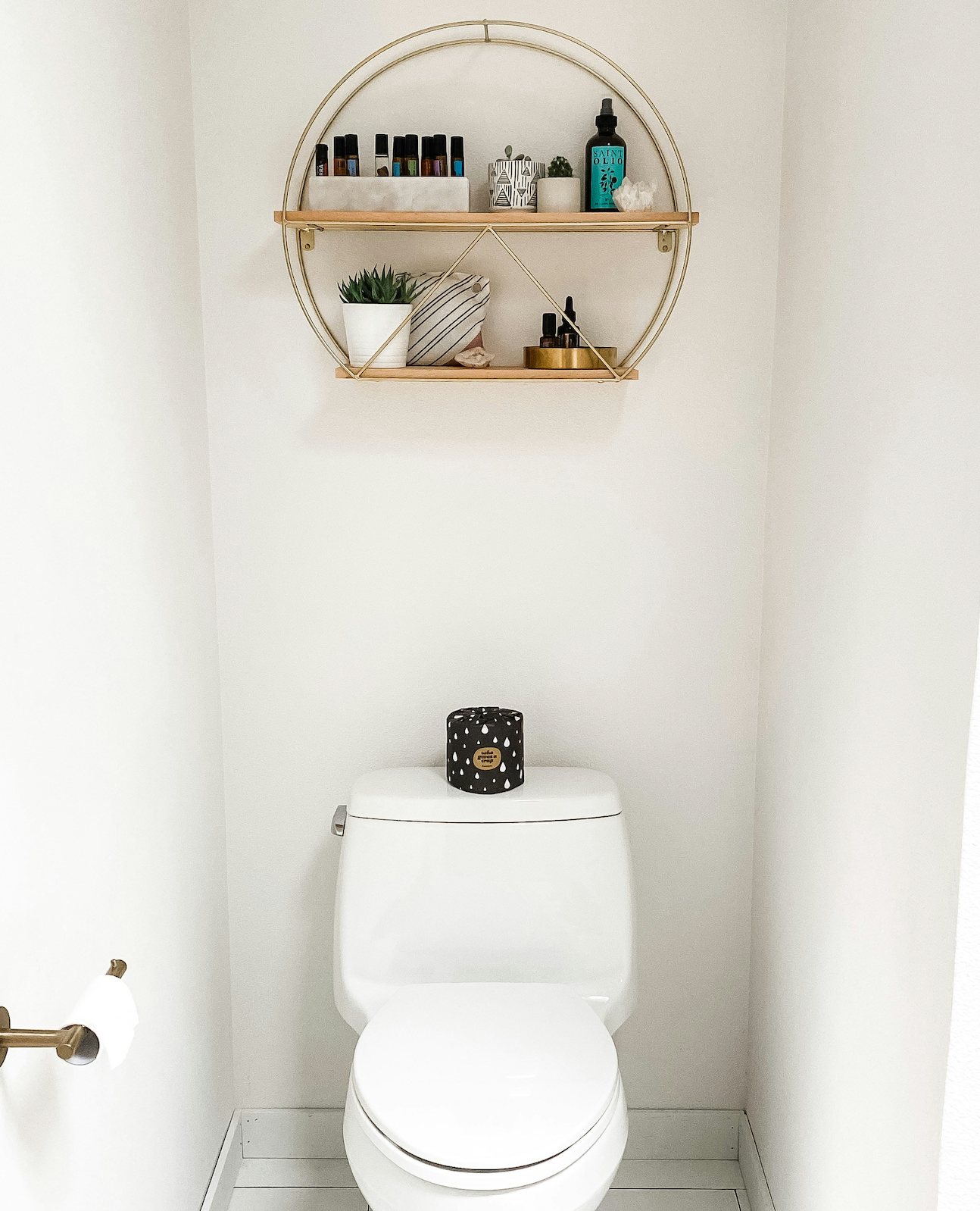 Circular Gold Shelf Organizes Small Essentials