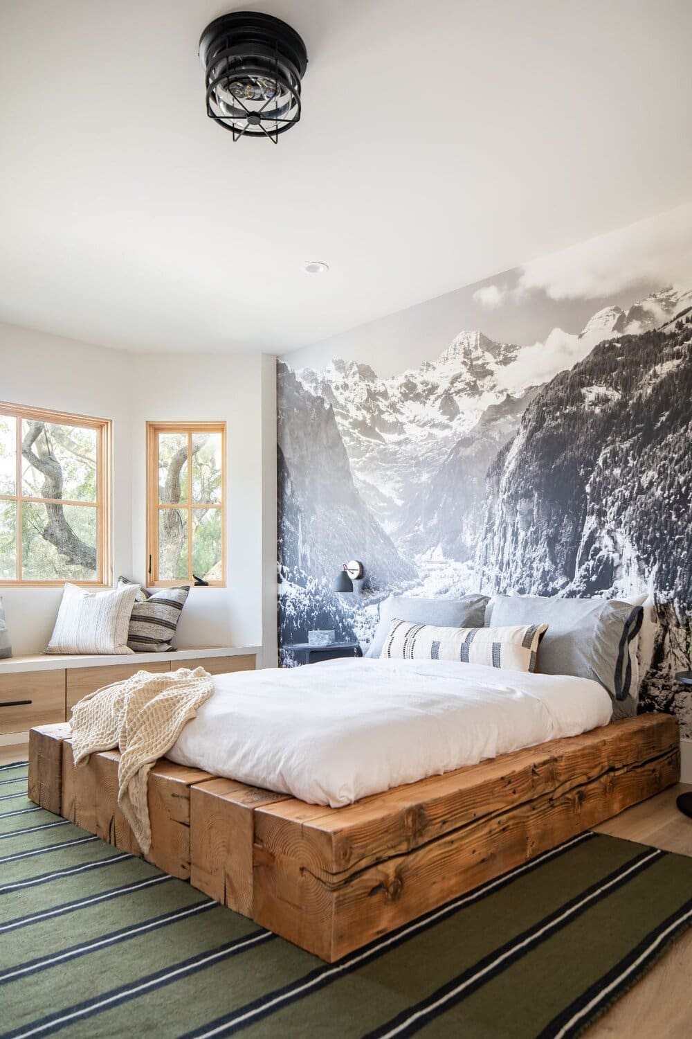 Dramatic Mountain Mural Creates an Immersive Bedroom Backdrop