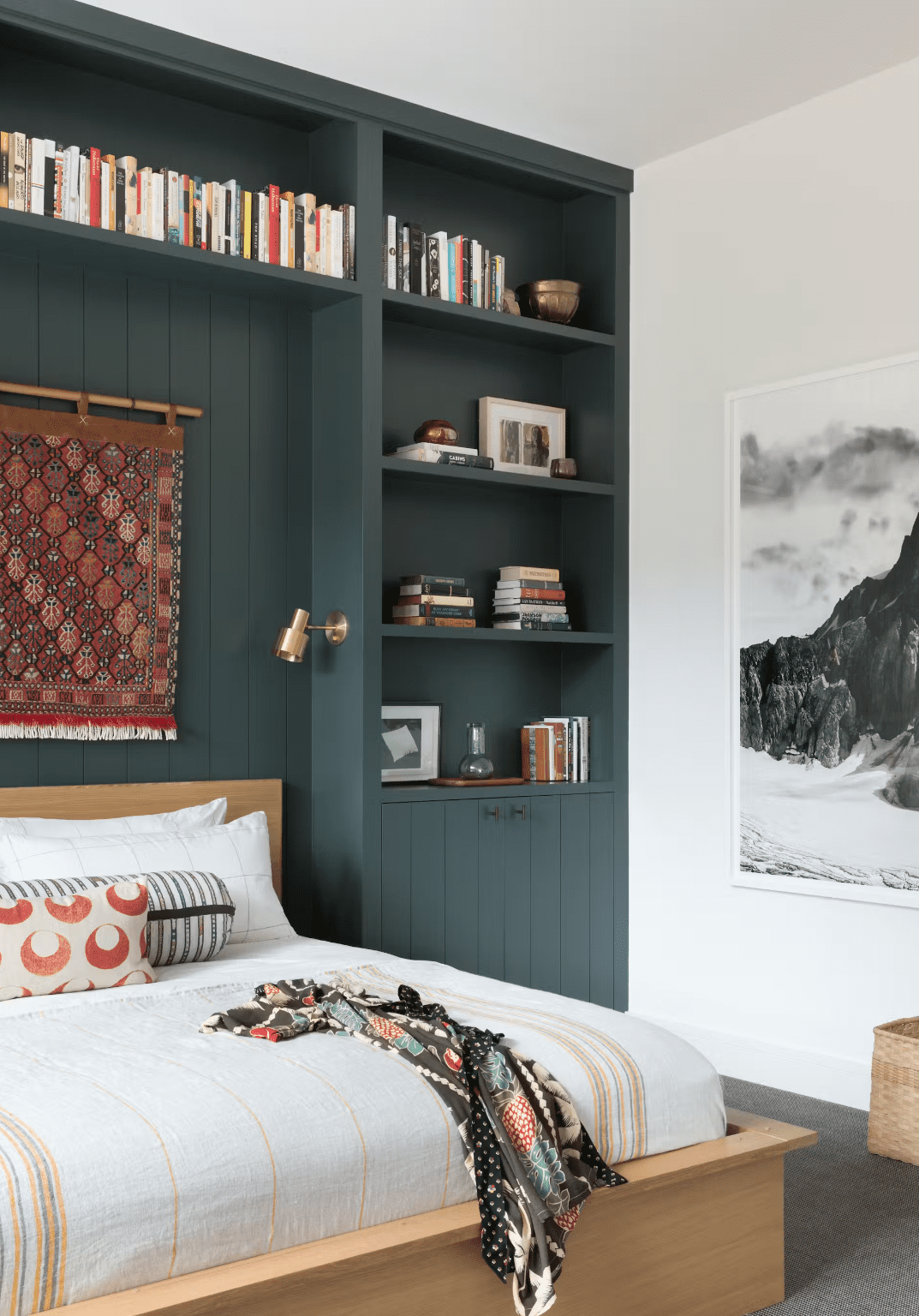 Built-in Shelving Creates a Moody Backdrop with Functional Storage