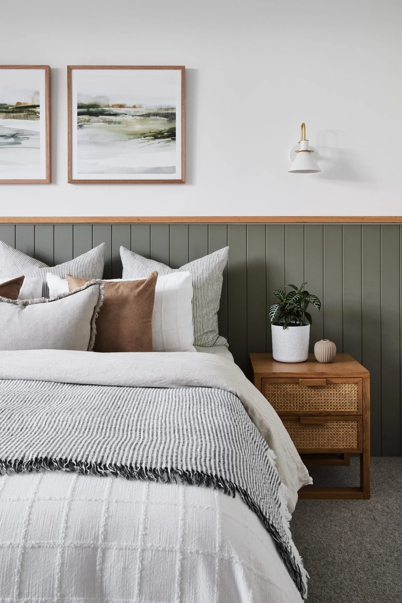 Vertical Slatted Wall Adds Depth Behind Bed