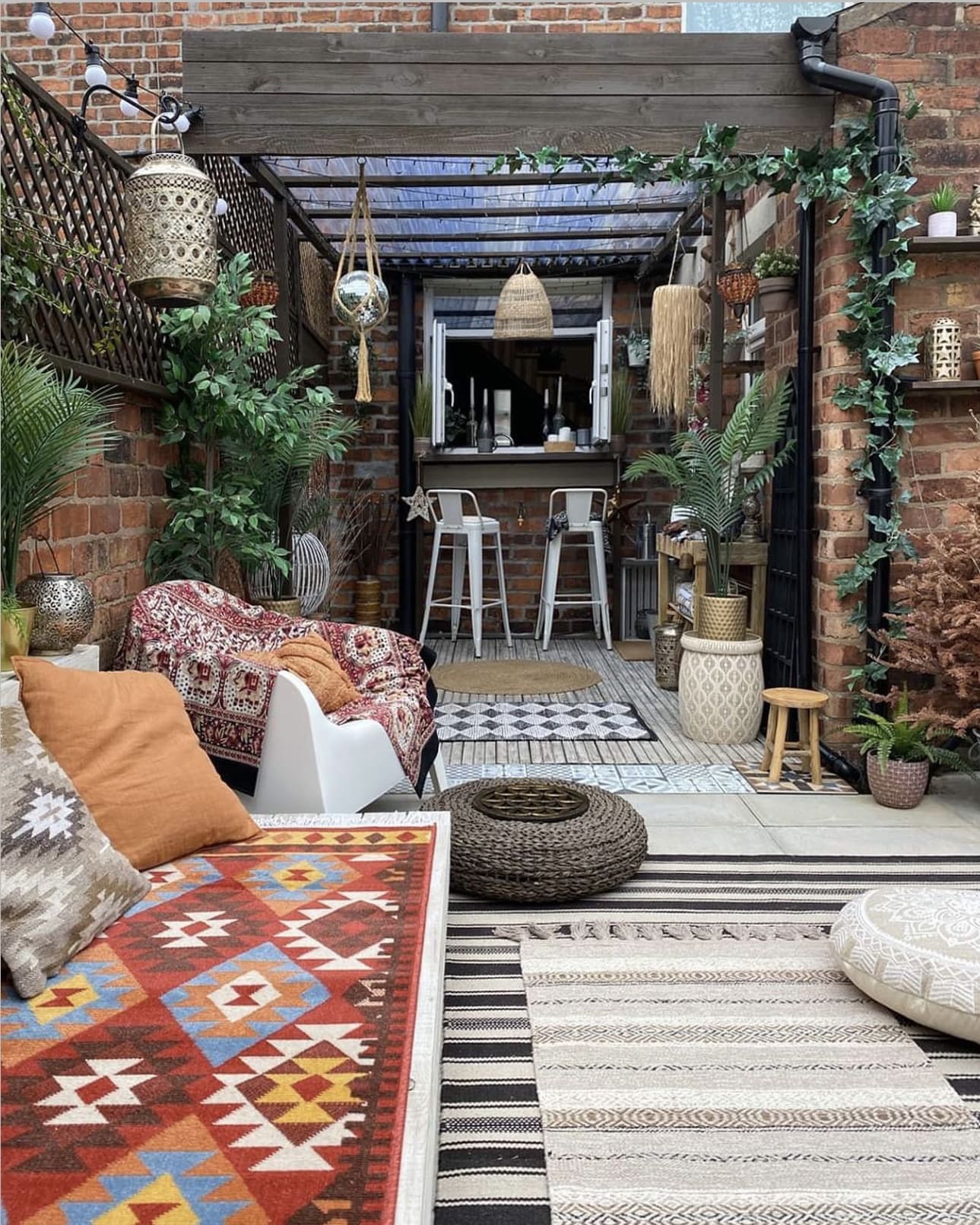 Boho Backyard Bar with Hanging Lanterns and Plants