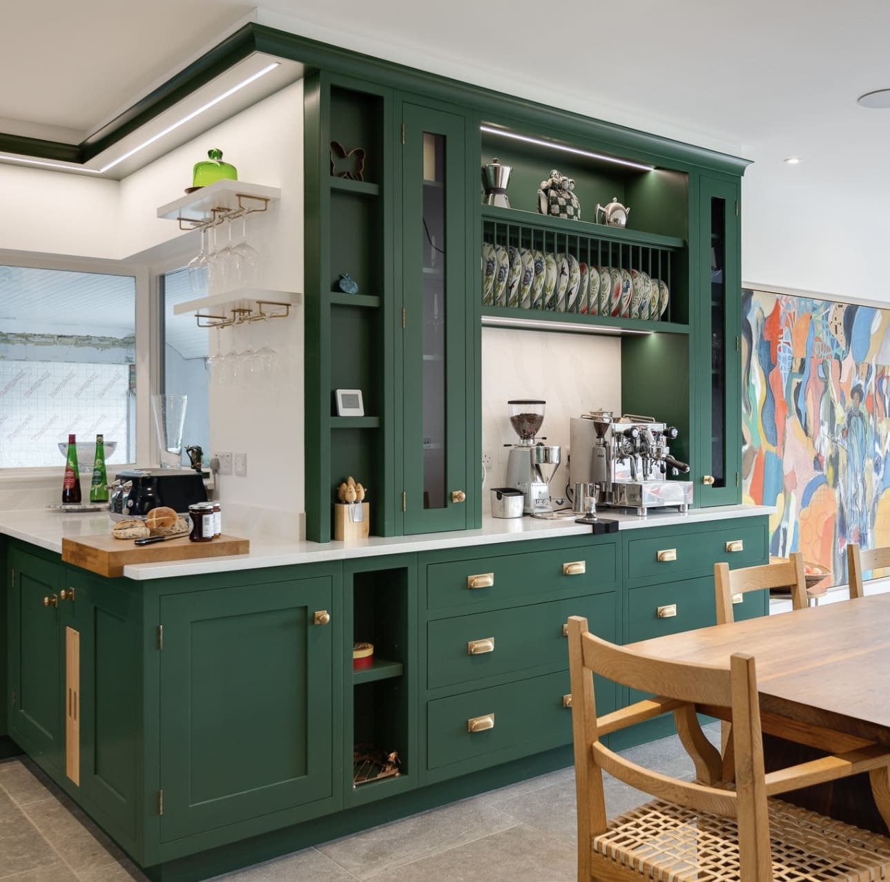Deep Green Built-In Cabinetry with Integrated Plate Rack