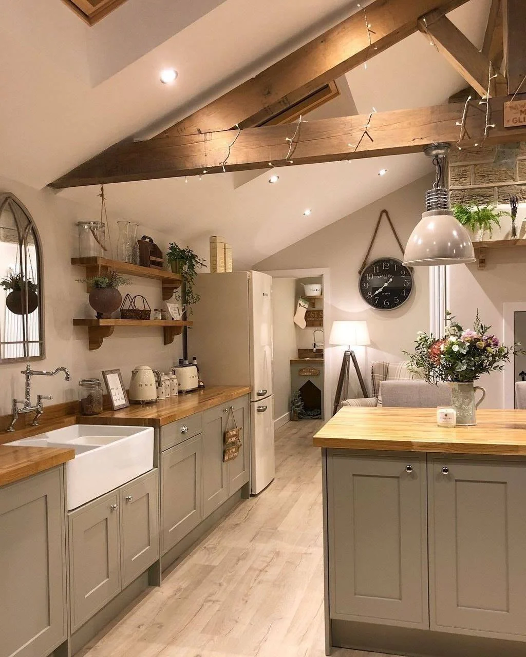 Farmhouse Island With a Butcher Block Top and Subtle Grey Cabinetry