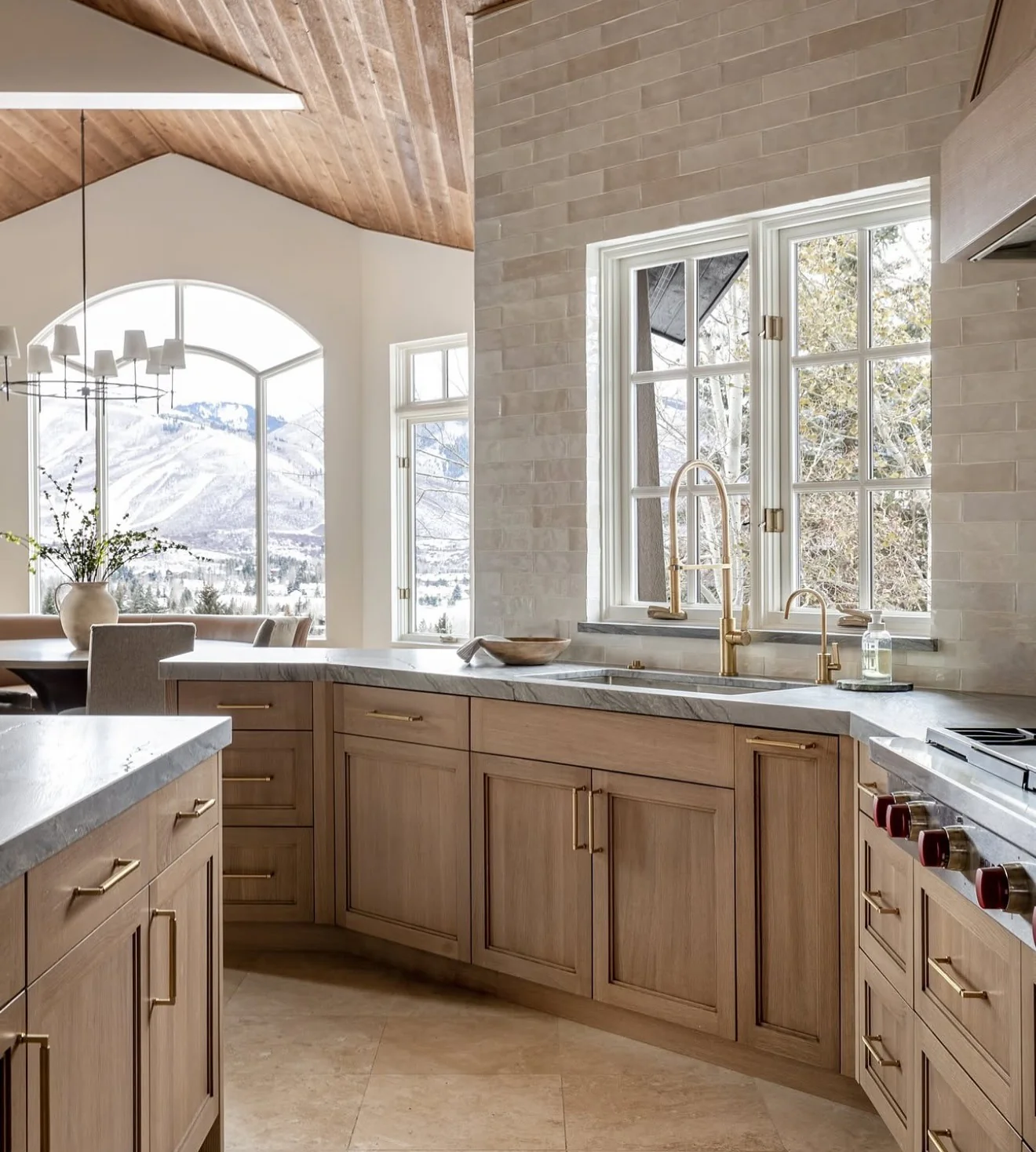 Natural Wood Island With Minimalist Brass Hardware