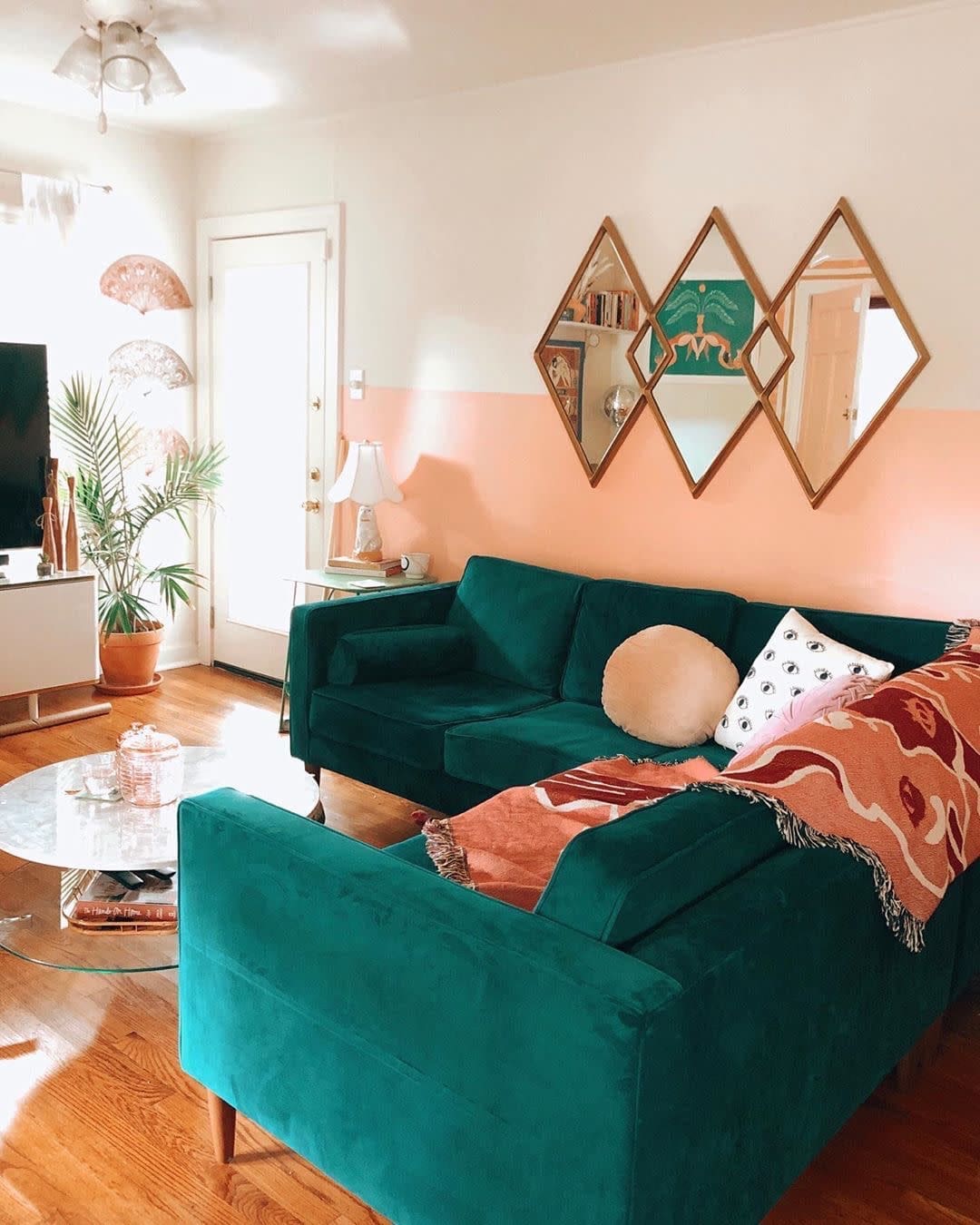 Diamond Mirrors Create a Geometric Focal Point Above the Sofa