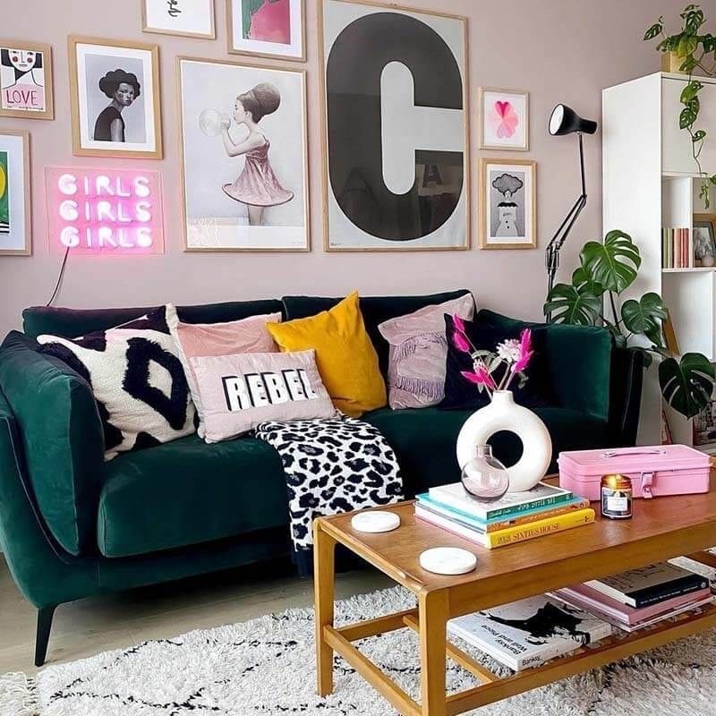 Pink Neon Sign Adds a Playful Pop Above the Green Sofa