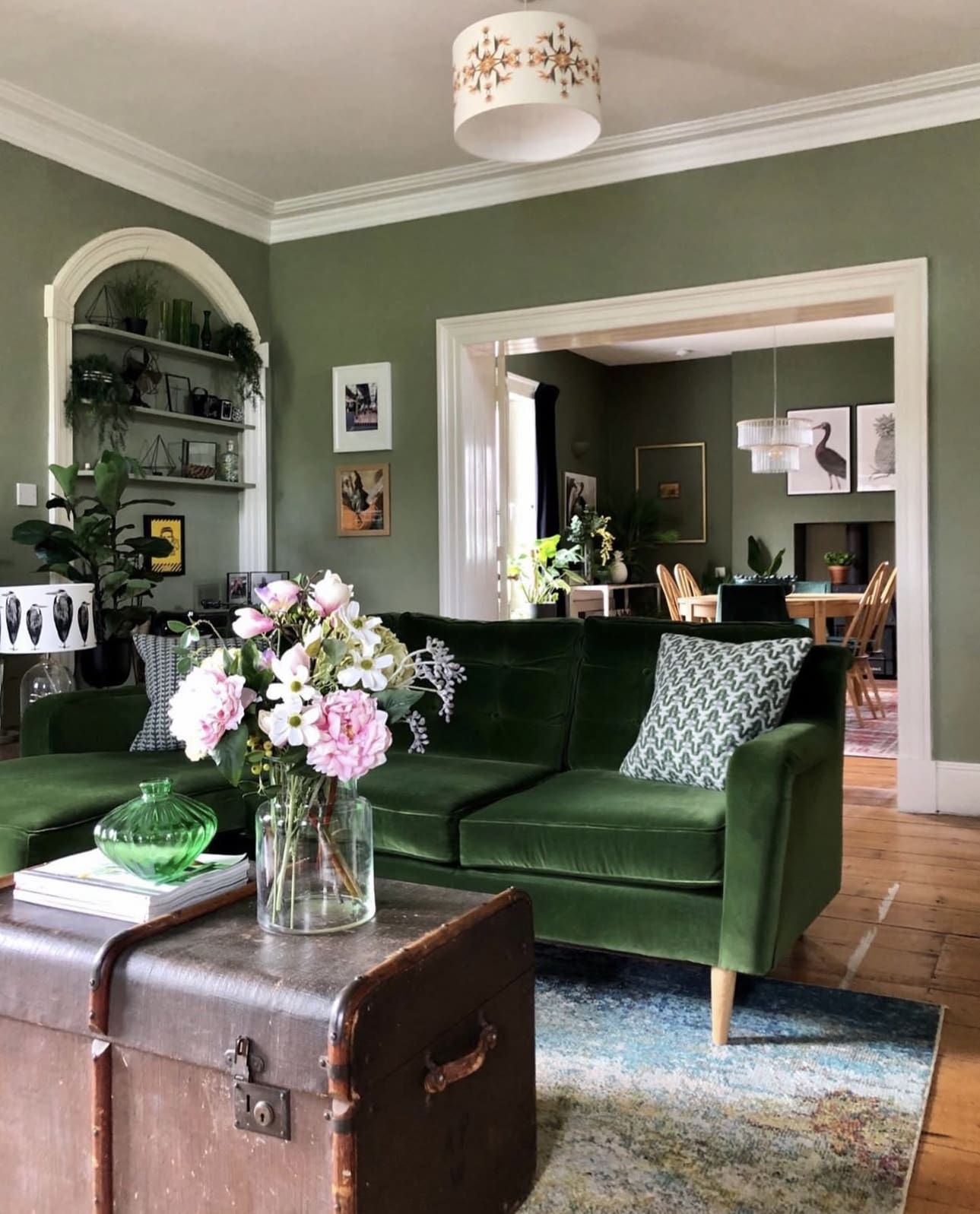 Vintage Trunk Coffee Table Adds Character to Green Sofa Space
