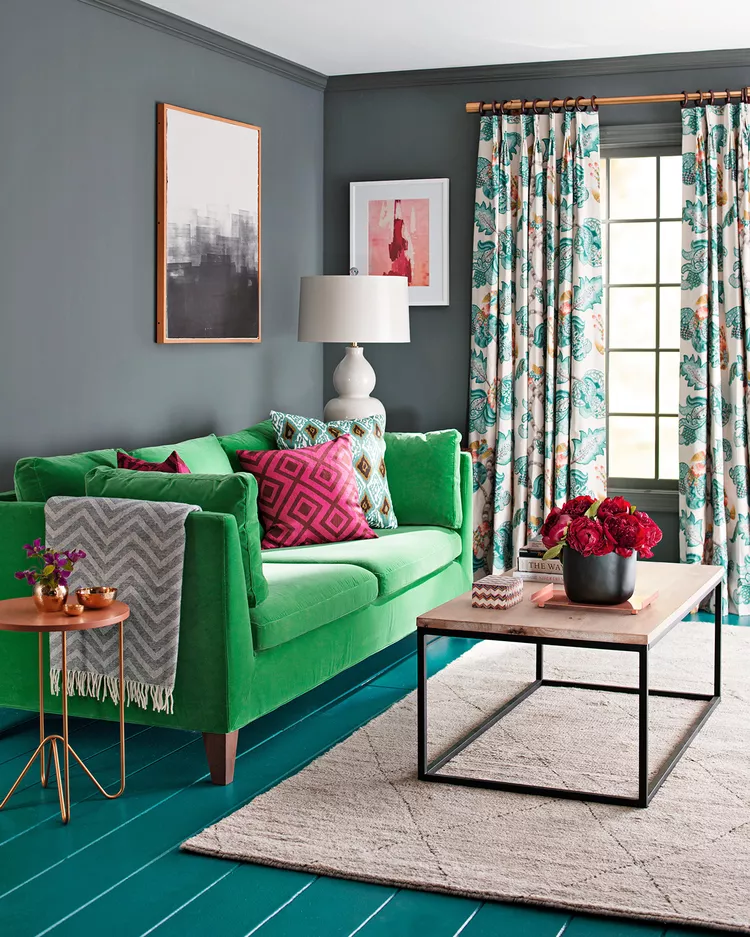 Emerald Green Sofa Pops Against Dark Grey Walls