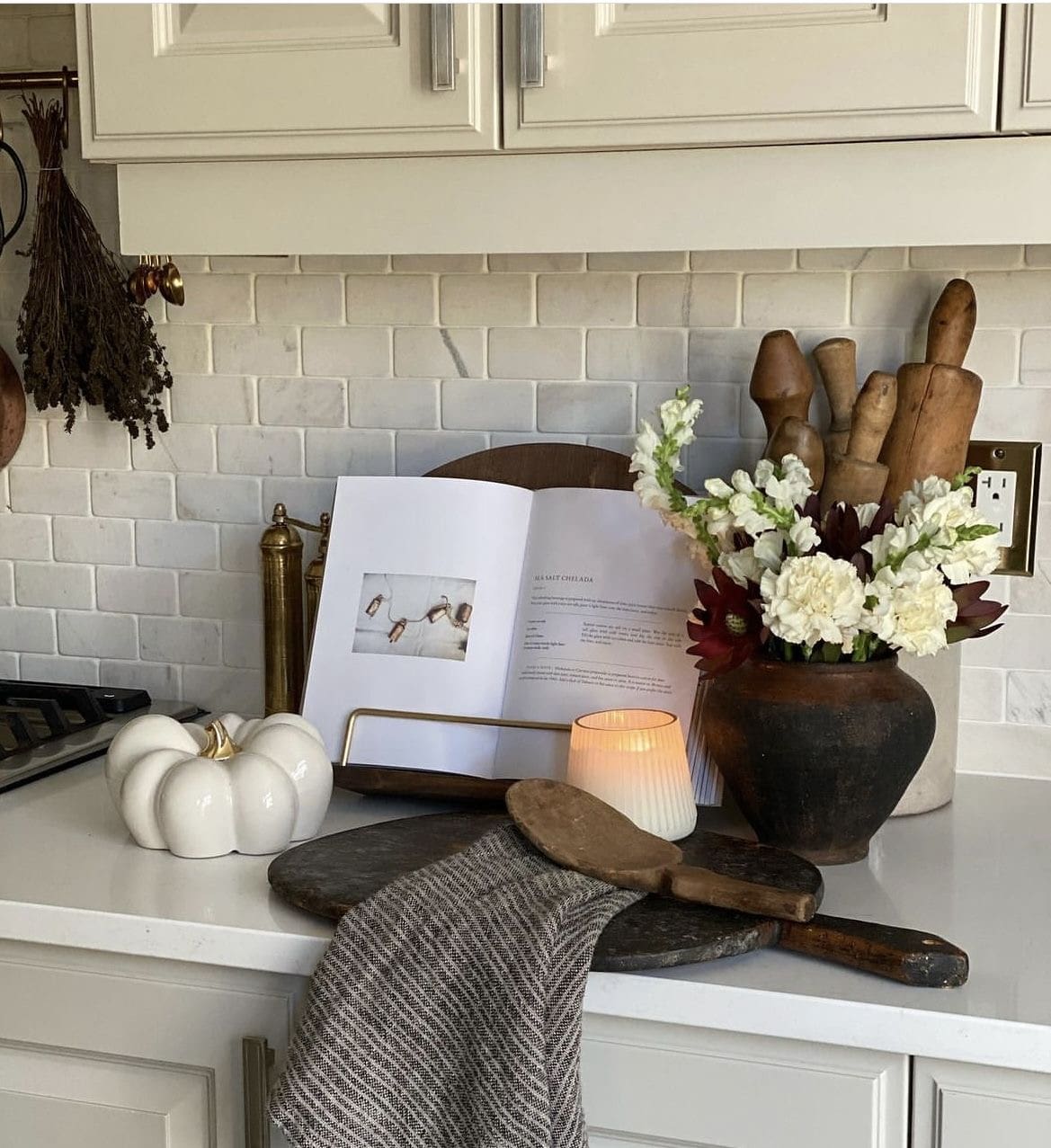 Grouped Vintage Rolling Pins as a Rustic Vase