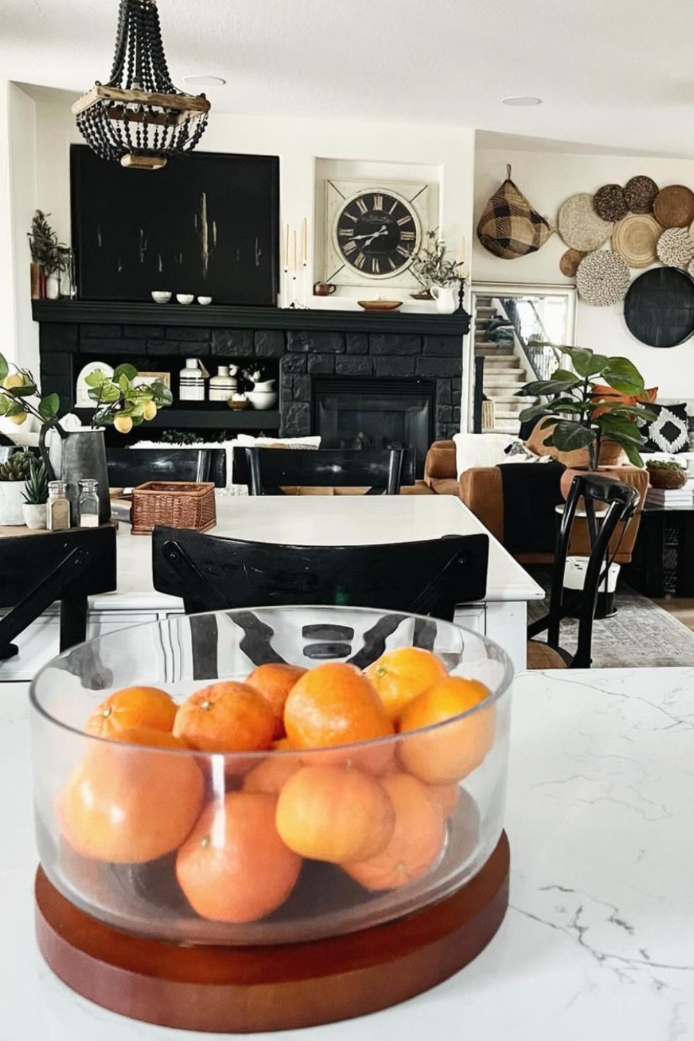 Clear Bowl with Wooden Base Holds Bright Citrus