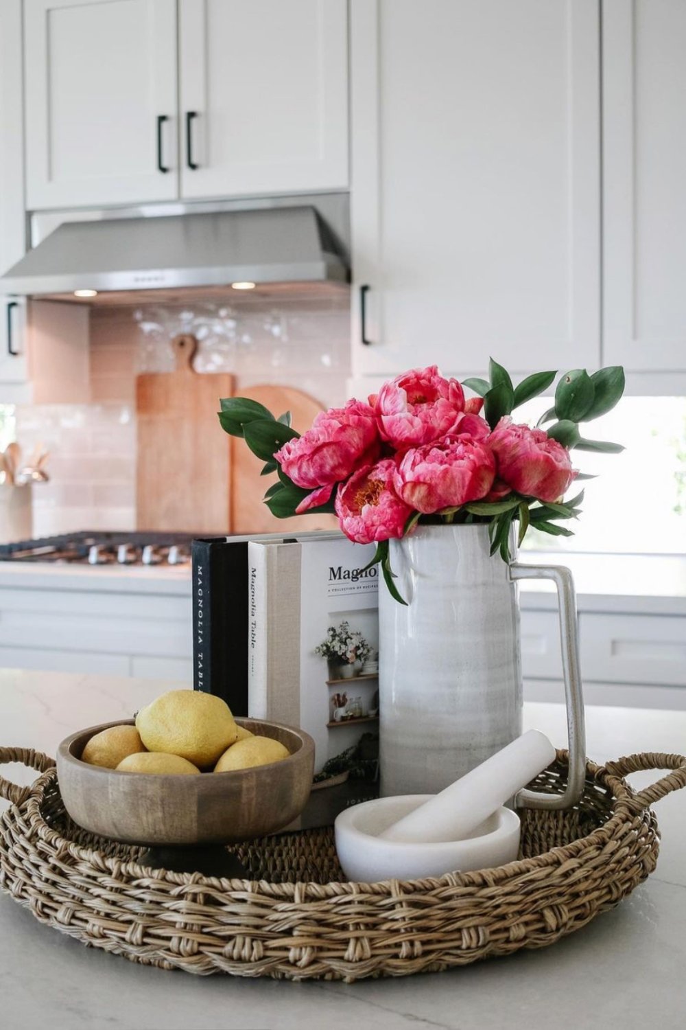 Bright Peonies in a White Pitcher Add a Lively Touch