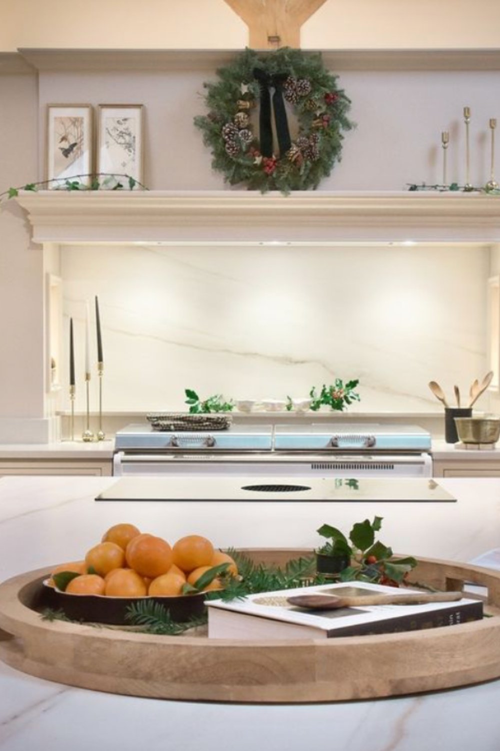 Round Tray Anchors Oranges and a Cookbook